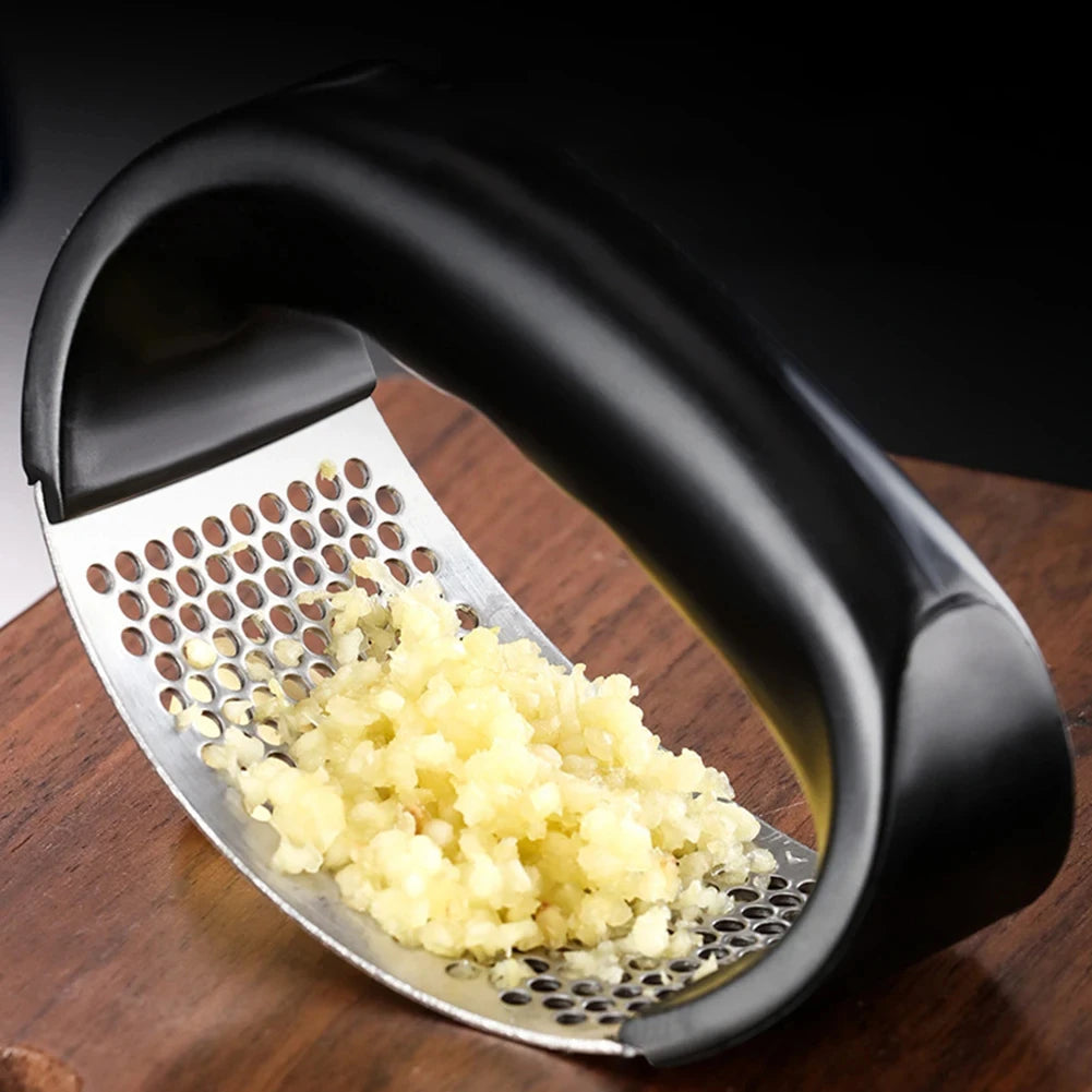 Stainless Steel Garlic Press – Effortless Mincing Tool